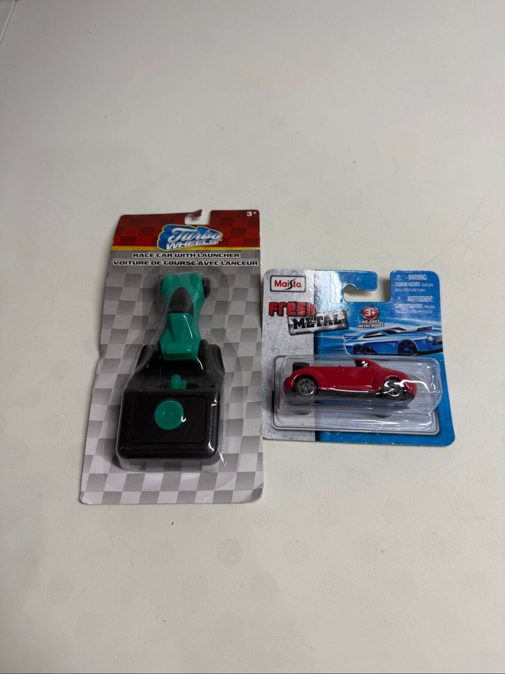 Set Of 2 Die Cast Toy Cars Red Rush Metal And Green Race Car With Launcher